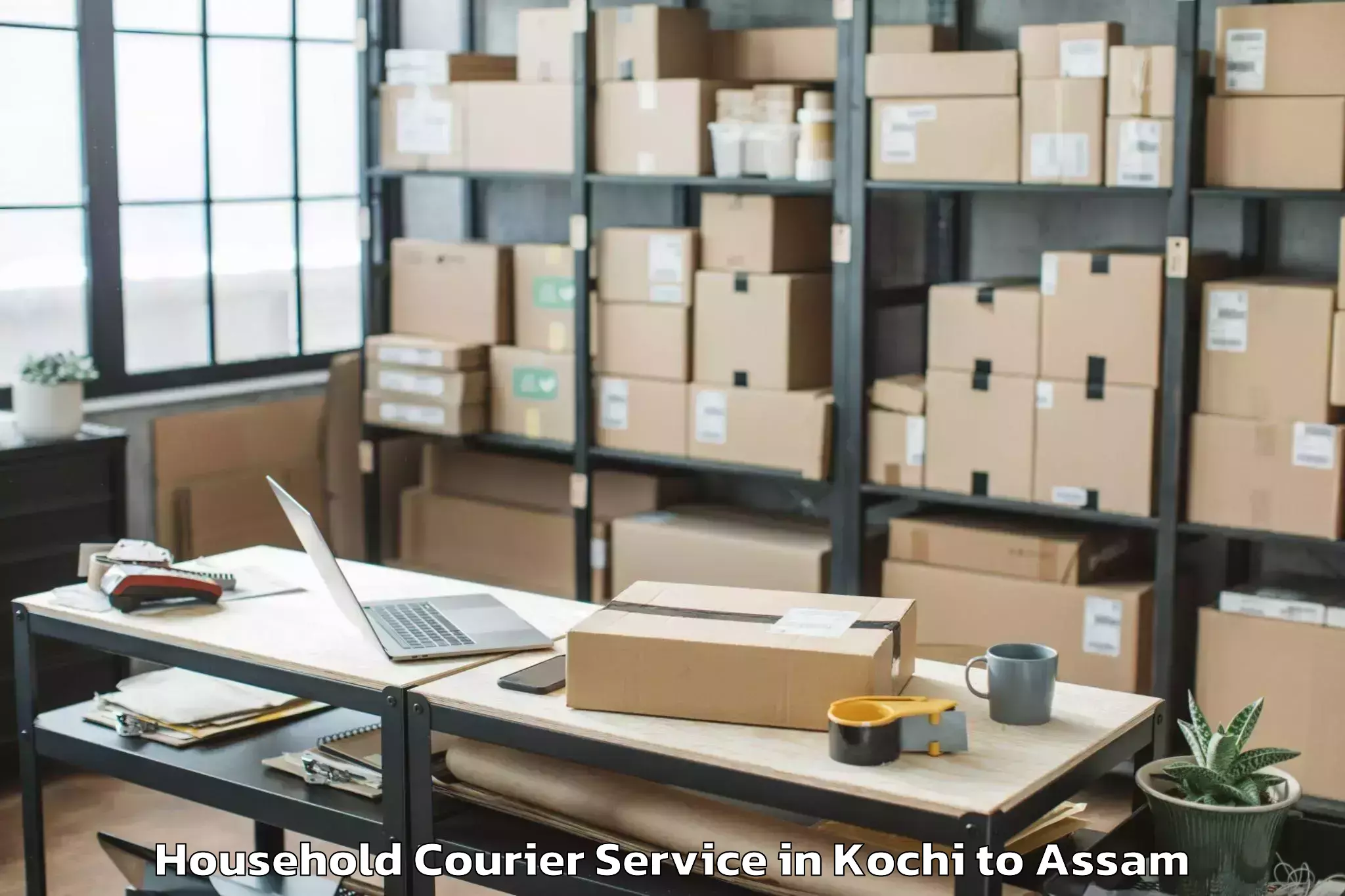 Easy Kochi to Kharupatia Household Courier Booking